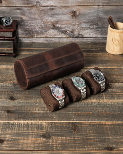 Three removable watch cushions displayed in front of the closed Espresso triple watch roll.