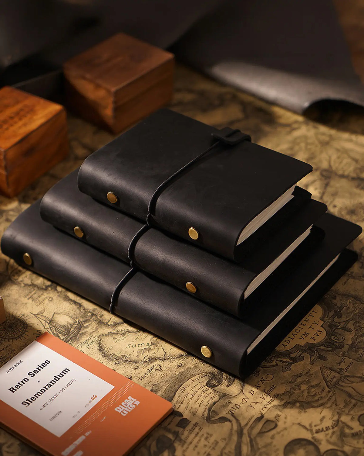 Black Legacy Loop journals shown in several sizes for comparison; one A5 journal sold