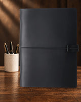 Black Legacy Loop A5 leather ring-binder journal with plain cover and wrap closure