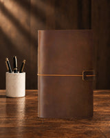 Cognac Legacy Loop A6 leather ring-binder journal with a plain cover and wrap closure