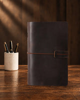 Espresso Legacy Loop A6 leather ring-binder journal with a plain cover and wrap closure