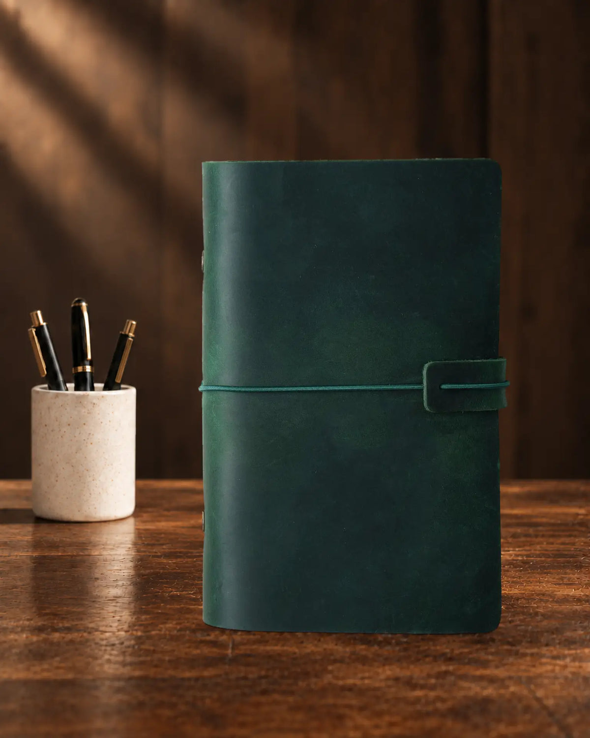 Forest Green Legacy Loop A6 leather ring-binder journal with a plain cover and wrap closure