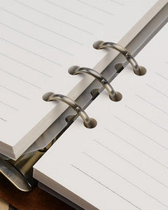 Legacy Loop six-ring mechanism holding lined loose-leaf paper