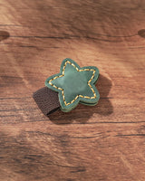 Forest Green leather star magnetic bookmark with contrast stitching and elastic pen holder
