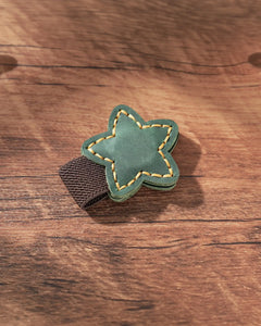 Forest Green leather star magnetic bookmark with contrast stitching and elastic pen holder
