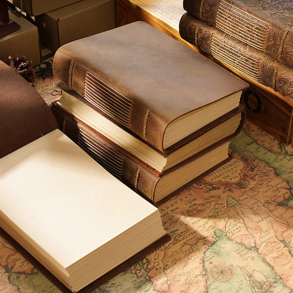 Stack of books with a leather-bound design on a map, resembling an ottoman.