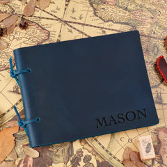 Blue leather journal with tie strap closure