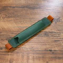 Green leather pen holder with elastic strap
