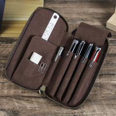 Vintage leather 4-pen case open showing pen slots