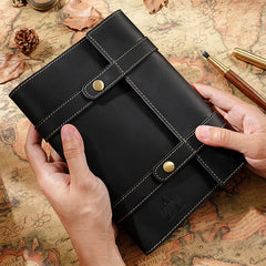 Black vintage leather journal with strap