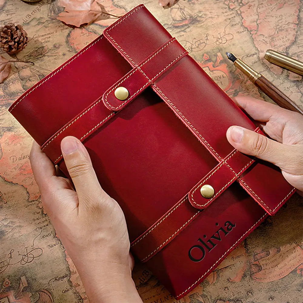 Red leather journal personalized with strap closure