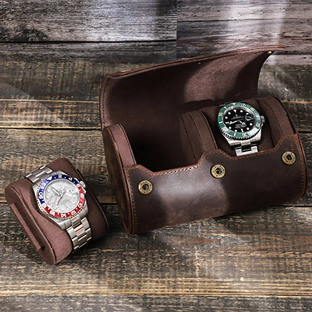 Two watch leather roll open showing padded compartments